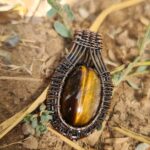 گردنبند سنگ چشم گربه با رکاب مس بافته شده