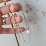 دستبند مروارید استیل طلایی